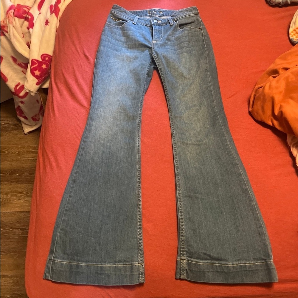 LOLA KIMES RANCH LOW RISE JEANS 
size: 0
inseam: 30
medium light wash 
brand new